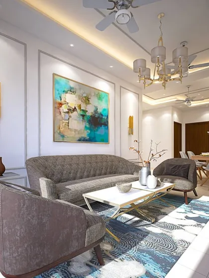 A bright and airy living room where I used a combination of modern furniture and classic wall mouldings. The large abstract artwork provides a splash of color, while the metallic accents in the lighting and coffee table add a touch of glamour.