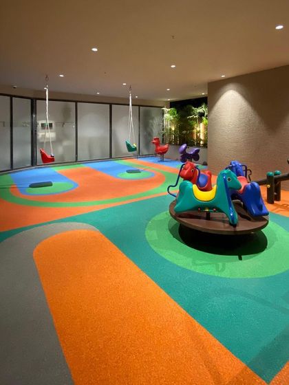 We transformed an often-unused stilt area into a colorful and safe semi-open play zone for toddlers, proving that great design can maximize any space.