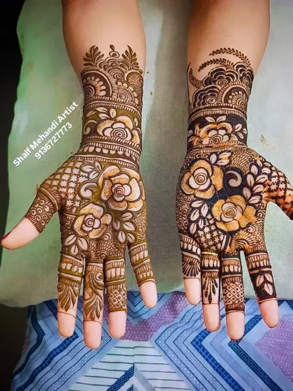 A stunning floral design with a mix of roses and jaali (net) patterns, showing a beautiful healed stain.