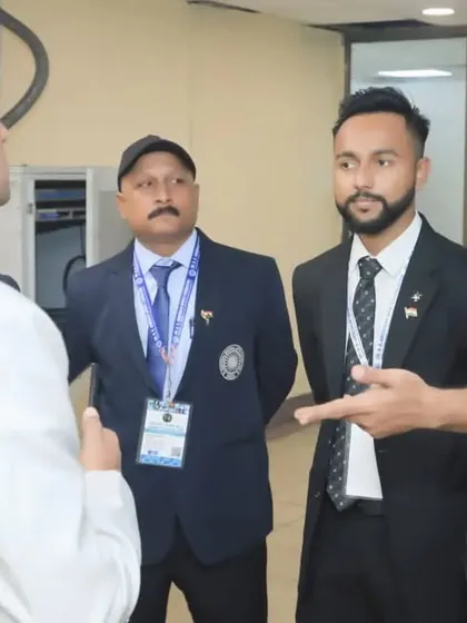 Our leadership is always on the ground, engaging with participants and officials. This photo shows an important discussion taking place during one of our national games, ensuring everything runs smoothly.