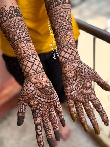 A detailed design for an engagement, featuring heavy geometric and floral patterns.