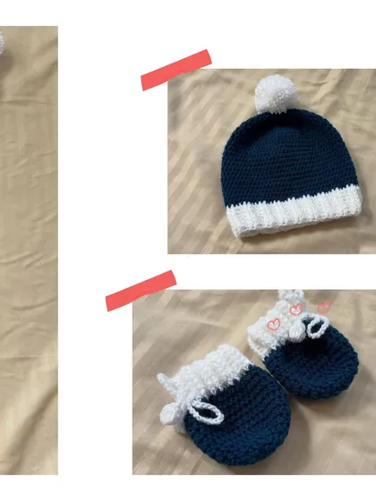 A closer look at the accessories from the navy set. The pom-pom cap and tiny mittens with heart details are designed to keep the baby's head and hands warm.