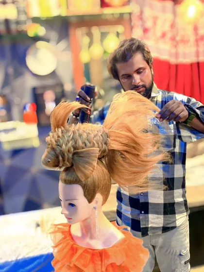 Another shot of me working on the artistic fish hairstyle. These projects are a passion of mine and a key part of the creative techniques I teach.