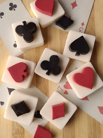 A styled shot of the Poker theme soaps. They are scented with a luxurious Oudh fragrance, making them a sophisticated and quirky gift for the festive season.