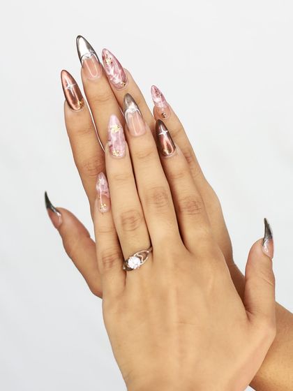 A full view of the mismatched pink marble and chrome set, showing how the different finishes complement each other.