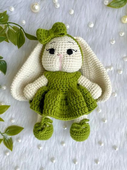 Look at this adorable bunny with her long, floppy ears and sweet green dress! I love when customers have unique ideas, and this long-eared bunny was a joy to bring to life. She is so soft and posable.