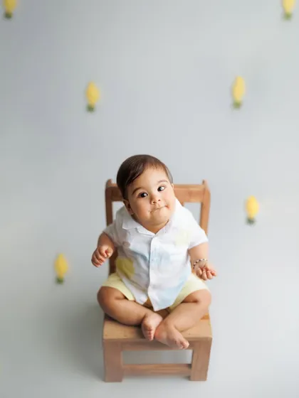 Let me brighten your weekend. This playful shot with a lemon theme is a fun and creative idea for a sitter session or a half-birthday photoshoot.