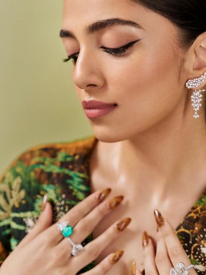 A beautiful shot of Ahsaas Channa wearing my custom tortoise shell nails. The warm tones and glossy finish of the nails perfectly complement the earthy, textured outfit and stunning jewelry.