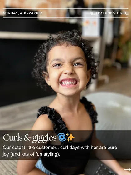 Curls and giggles with our cutest little customer. It's pure joy styling her hair, and I make sure to use gentle techniques to keep her curls happy and healthy.