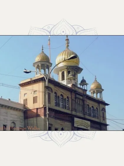 A sunlit view of the golden domes of Gurudwara Sisganj Sahib. Our walk here covers the story of the Guru's sacrifice for religious freedom.