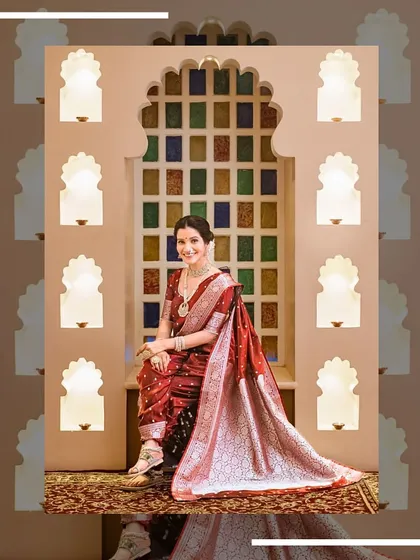 A full view of the Navari saree, showing its elegant drape and the beautiful setting.