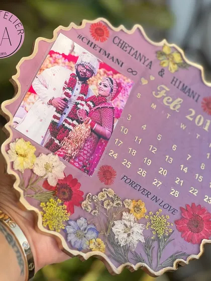 A lovely lilac-themed wedding frame, customized with the couple's hashtag and wedding date. The mix of colorful flowers makes this piece a cheerful addition to any home.