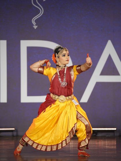 A powerful and energetic pose from a student in the open category. Her dynamic performance was awarded 2nd place.
