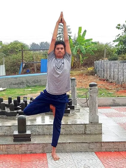 Holding Vrikshasana amidst these ancient lingam symbols connects my practice to the timeless tradition of yoga. This pose strengthens the legs, opens the hips, and cultivates the unwavering focus required for both physical and spiritual balance.