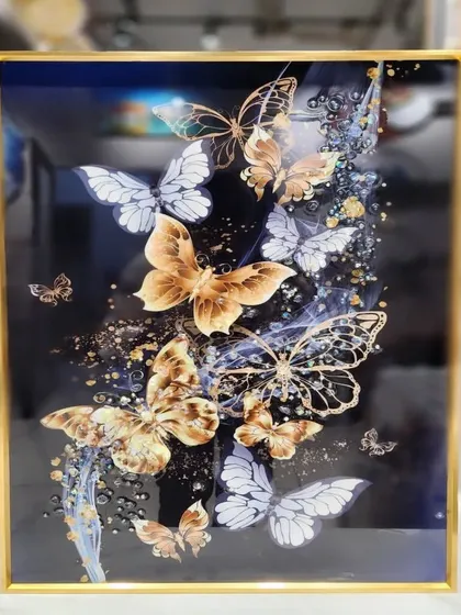 A flight of delicate butterflies is captured in this enchanting 16x24 inch crystal painting. The mix of gold, white, and translucent wings against a dark background creates a magical and sophisticated visual effect.