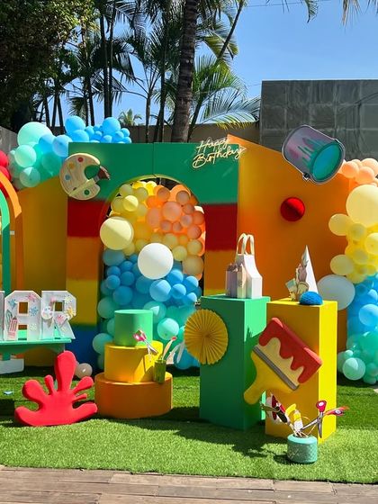 For a young art lover's fifth birthday, I designed a poolside party that was a true burst of color. The theme was incorporated into every element, including fun activities like spin art and doodling stations that let the little guests unleash their own creativity.