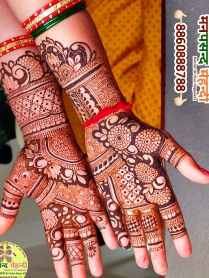 A beautiful and dense floral design perfect for any festive occasion. The intricate patterns on the fingers and palms showcase a high level of skill.