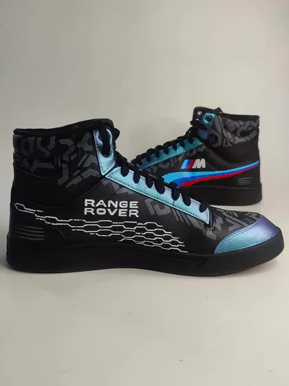 Custom-made Puma high-tops for a private client who loves luxury cars. This pair features details from both Range Rover and BMW.