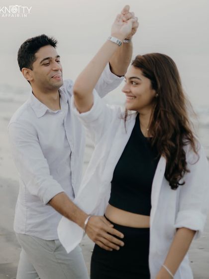 A spontaneous dance on the sand. I love capturing these moments of unscripted joy that truly reflect a couple's playful dynamic.