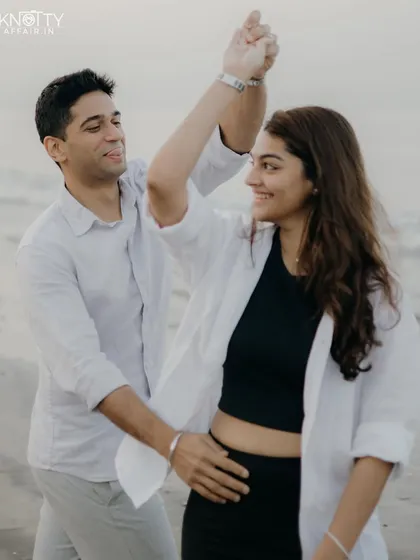 A spontaneous dance on the sand. I love capturing these moments of unscripted joy that truly reflect a couple's playful dynamic.
