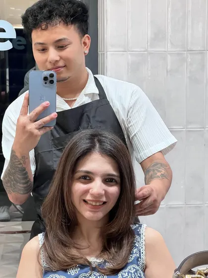 When I make my clients smile, that’s real success. This client is glowing with her new haircut and beautiful, healthy brown hair.