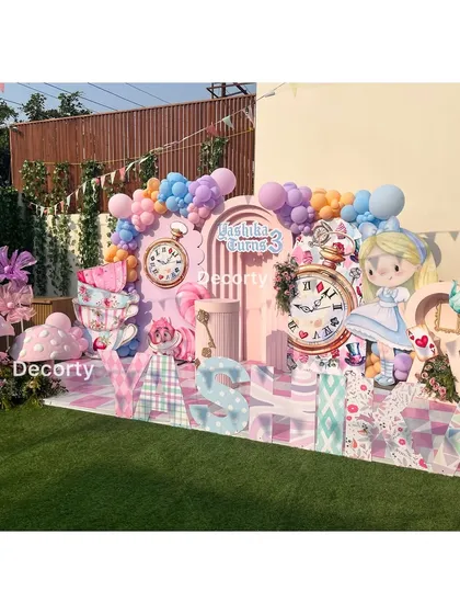 A wide shot of the colorful and playful Alice in Wonderland stage.