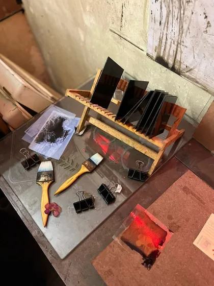 The tools of the trade for our cyanotype and alternative photography workshops. Here you see brushes for coating, glass plates for contact printing, and clips for drying, all laid out and ready for a day of creating.
