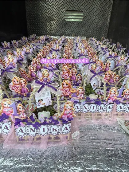 Need to thank a lot of guests? We've got you covered! Here’s a look at a massive order of 150+ Rapunzel-themed hampers for Anika's first birthday, all packed and ready to be delivered. We can handle bulk orders for any theme you can imagine.
