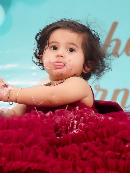 The pure joy of a first birthday cake smash! We are there to capture every messy, happy, and unforgettable moment.