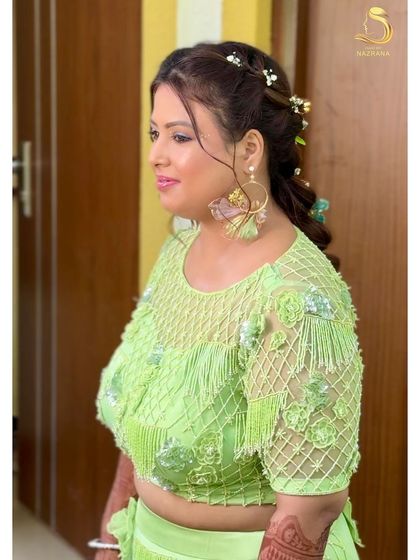 My bride looking radiant with her floral braid for her Goa Mehendi ceremony.