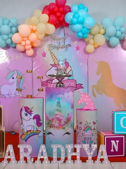 A magical unicorn-themed first birthday party, filled with pastel colors, rainbows, and enchanting details.