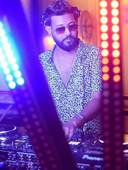 A close-up shot while mixing, with the club lights adding to the atmosphere.