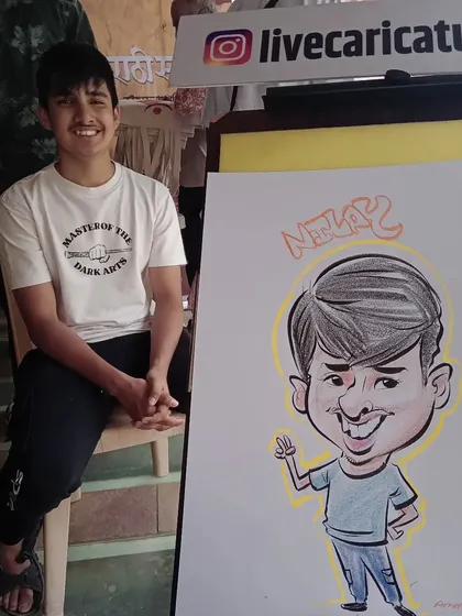 This young man, Neelay, looks cool and confident in his full-body caricature.