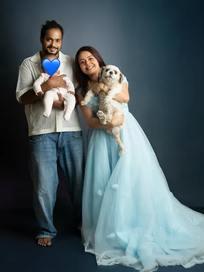 The whole family, including the furry members. I believe pets are family too, and I was so happy to include their beloved dog in this portrait with celebrity Devoleena.