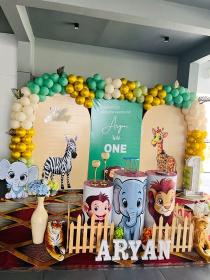 Another view of the three-panel arch backdrop for a 'Wild One' birthday party.