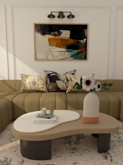 This living room design features a large, comfortable lounger sofa, perfect for relaxing. The classic wainscoting on the walls adds a touch of architectural charm and refinement.