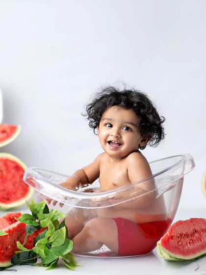 Watermelons are the smiles of summer. This fun and unique tub bath theme with fresh watermelons is perfect for a summer baby.