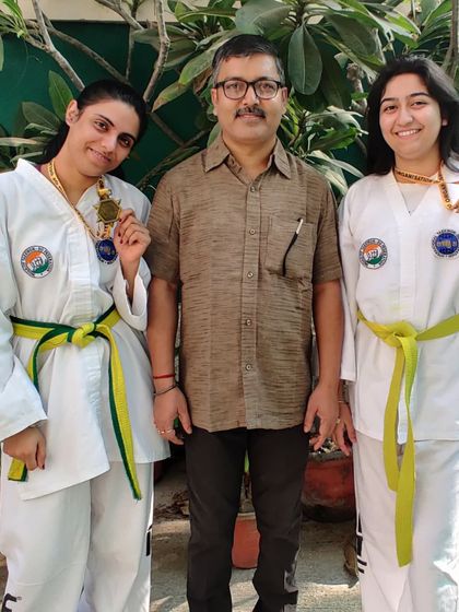 Two of our senior female students with their gold medals from the 3rd Delhi State Taekwon-Do ITF Championship.