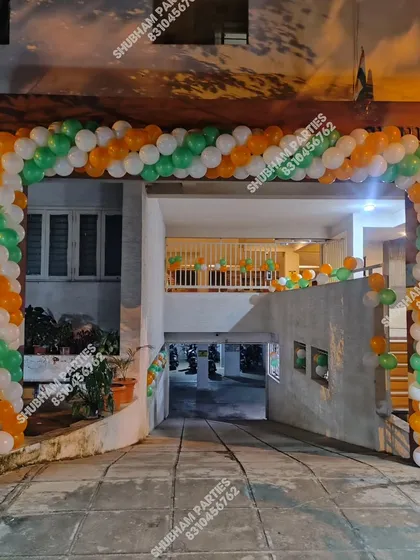 Another view of the impressive tricolor balloon arch for a building entrance.