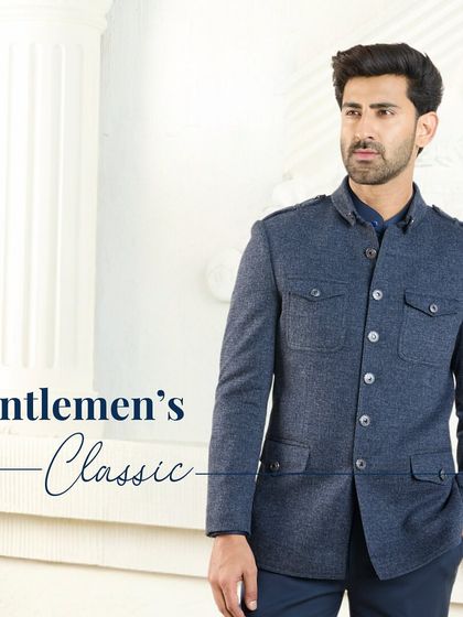 A Gentleman's Classic. This textured navy co-ord set, featuring a Jodhpuri-style jacket, is a harmonious blend of elegance and refinement, making it a perfect choice for a summer wedding or formal event.