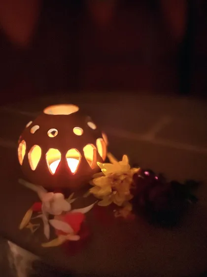 A simple, elegant tea light holder adding a warm and cozy feel to the studio during Diwali.