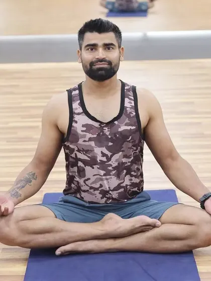 A moment of quiet reflection in a simple seated pose. The goal is to find "Shanti," or peace, by calming the fluctuations of the mind and centering the self in the present moment.