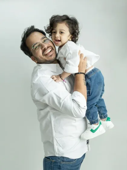 The joy of a father playing with his son. These are the energetic and happy moments I love to freeze in time.