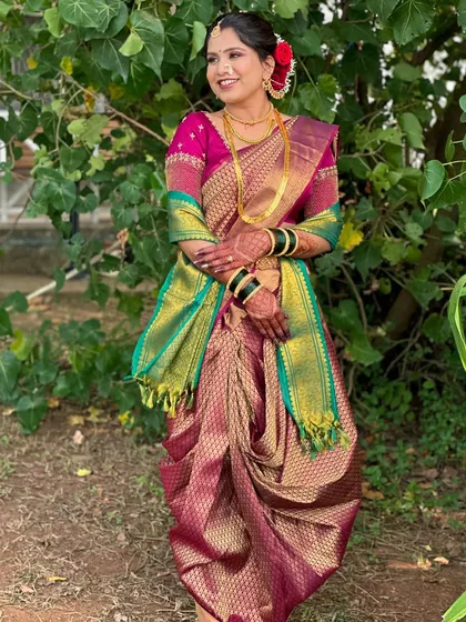 A full-length shot of a bride in a traditional Nauvari saree. My courses also include guidance on how makeup and hair complement the entire bridal ensemble.