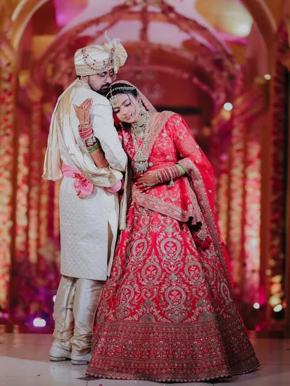 A tender moment captured from the wedding day. The bride resting her head on the groom's shoulder shows their deep bond and comfort with each other.