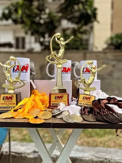 A close-up of the trophies and medals awarded at our Inter-Society Basketball Tournament.
