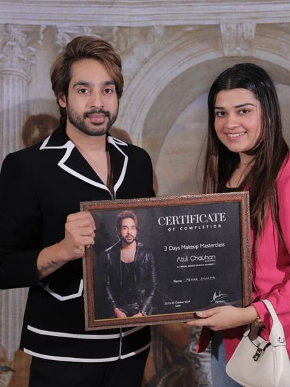 A happy and proud moment for this student as she receives her certificate after three days of intense learning.