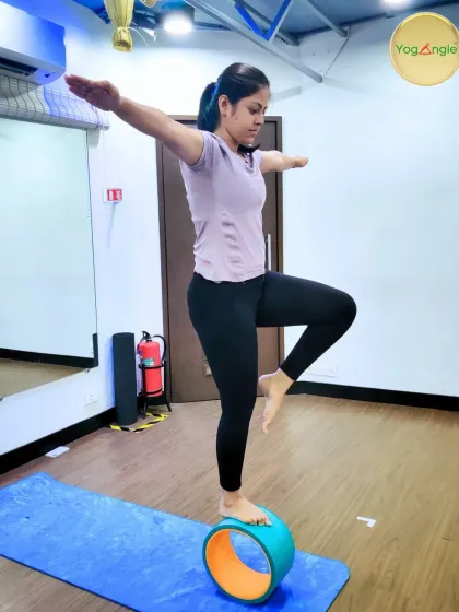 The yoga wheel is not just for stretching; it's also a powerful tool for improving balance. Standing on the wheel requires immense focus and core engagement, helping you discover your stability from the inside out.