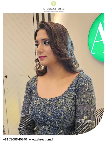 Another angle of this elegant party style, showing how the side-parted curls frame the face beautifully.