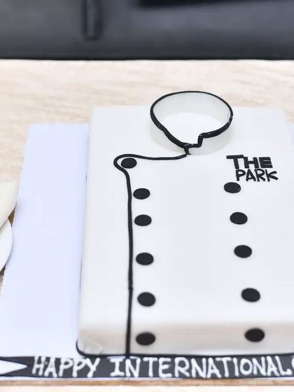 A special cake shaped like a chef's coat to celebrate my amazing culinary team on International Chef's Day.